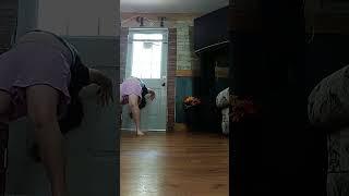 doing a backbend down a wall