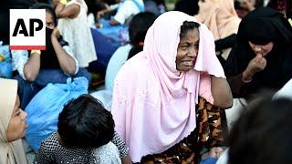 Students force Rohingya refugees out of Indonesia shelter