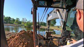 Busting The Pond Dam And Clearing The Island