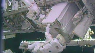 Astronauts complete risky repair job in Space Station