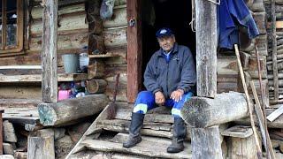 Living your whole life alone in a mountain hut is far from civilization. Hard life in wild forests.