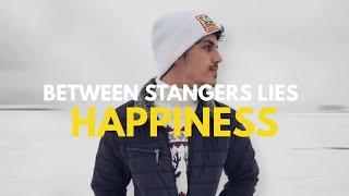 Between Strangers Lies Happiness - بين الغرباء تكمن السعادة .