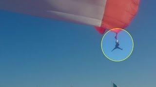Mexican soldier falls from 98 ft after getting tangled in giant flag