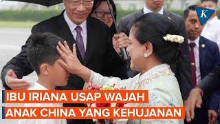 Momen Ibu Negara Usap Wajah Bocah China yang Menyambutnya di Tengah Hujan