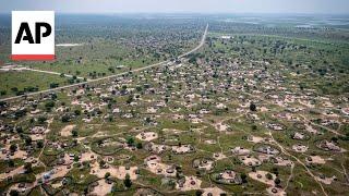 As flooding becomes a yearly disaster in South Sudan, thousands survive on the edge of a canal