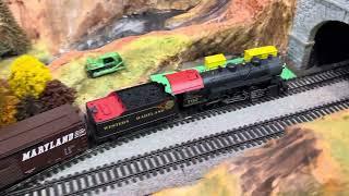 A friends s Guage layout. American flyer and S helper trains