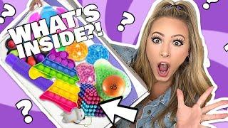 OPENING A HUGE MYSTERY FIDGET PACKAGE FROM MRS. BENCH! 