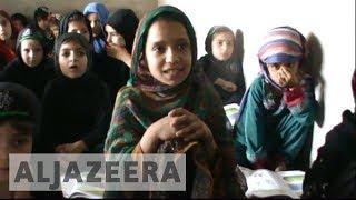 Afghan girls defy challenges to attend school