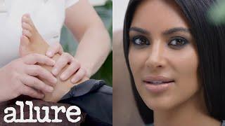 Kim Kardashian Gets a Foot Massage While Answering Questions | Allure