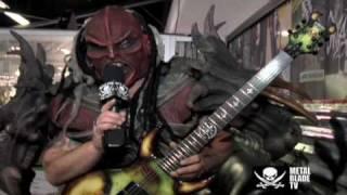 GWAR - Flattus Maximus shows off his custom Schecter guitar