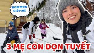 Mother and son clean snow outside. Bon Mun helps Mom very well - Thuy Jyri Family Finland