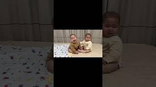 The elder brother wants to take the toy from his twin brother #baby#cute #funny#cutebaby#smile#twins