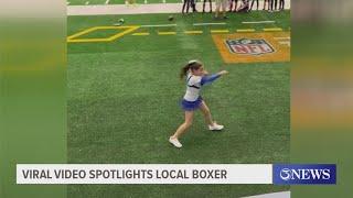 Viral video of cheerleader shadowboxing features local boxer