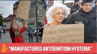 Germany ARRESTS Jewish Israeli Woman Over ‘Antisemitic’ Protest Sign