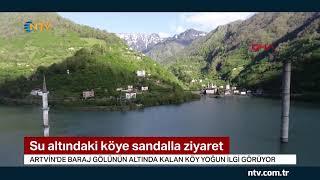 Su altındaki köye sandalla ziyaret