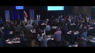 Michelle Cummings leads Simon Says with new rules during a keynote address