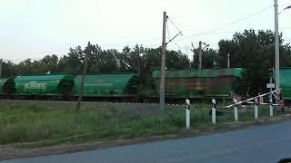 Freight train at a railway crossing