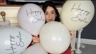 Blowing up Easter themed balloons