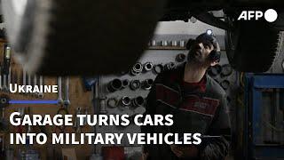 Ukraine garage turns rustbuckets into military vehicles | AFP