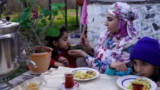 LIFE in the Village. Woman Cooking Uzbek Pilaf for Family.