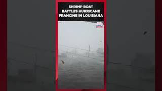 Shrimp boat sails through Hurricane Francine in Louisiana river