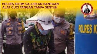 PENYERAHAN BANTUAN ALAT CUCI TANGAN BEBAS SENTUH DARI POLRES KOTIM