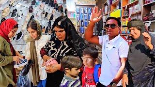 Toward school: Doora's children are shopping and getting ready for school