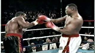 Oliver McCall vs Larry Holmes (highlights)