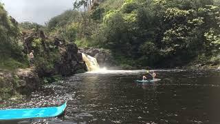 Umauma experience zip and dip swimming and cliff jumping in the water hole, Hawaii