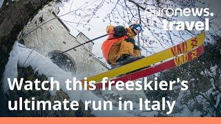 Watch this extreme skier take on steep hills and daring jumps in the Italian Alps