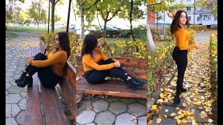 Bulgarian woman with orange top and curves wearing high heels