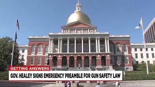 Healey signs emergency preamble for gun safety law