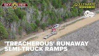 Why are I-24's runaway truck ramps on Monteagle Mountain on the left side of the road?