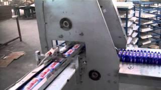 Horizontal flow wrap machine