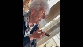 Granny smokes cigar 