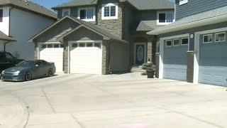 City of Calgary cracks down on 'super driveways'