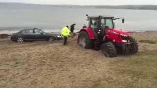 £120,000 Bentley stuck on a beach – had to be rescued by tractor