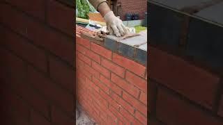 Bricklaying skills/front driveway wall