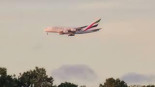 Emirates Airbus A380 landing in IAH at sunset