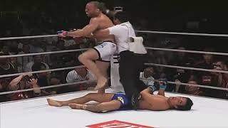 Axe Murderer Wanderlei Silva stomping his head in with a smile on his Face