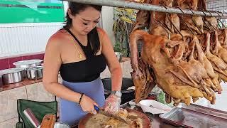 Fresh duck meat cut on the spot by a sexy lady - Thai street food