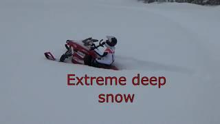 Long track rc snowmobile yamaha sr viper on extreme deep snow,jumping.