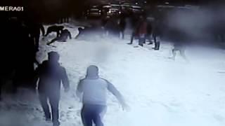 Moment huge snow chunk fell injuring two pedestrians in Turkey - BBC News