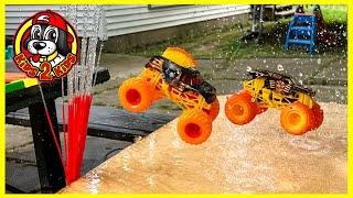 Monster Jam Fire & Ice WATER SLIDE RACE (ft. Hot Wheels Monster Trucks BIG RIGS)