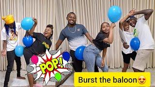 Burst the baloon gameNo hands involved ft Keshi & Biko and Ruih family/super fun/I propose this