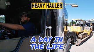 A day in the life of a heavy haul trucker | kenworth picking up dozer and roller from auction