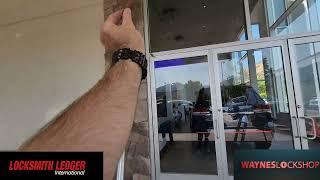 Wayne Winton fixing large doors car dealership drive in showroom doors Select SL57 continuous hinge