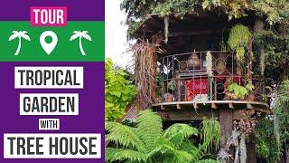 UK Tropical garden with a jungle tree house  Tropical garden design & ideas