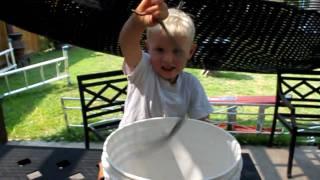 Bryce catches a snake in our Lillooet back yard