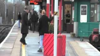 Drunk Fella wizzing around on a lamp post at Wigan North Western